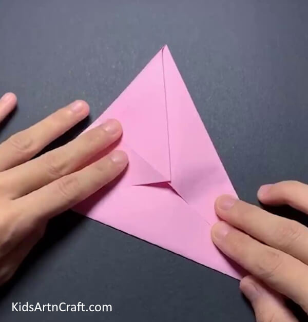 Folding The Top Edge Crafting an Origami Bunny with Yellow Paper Sun - A Tutorial for Kids 