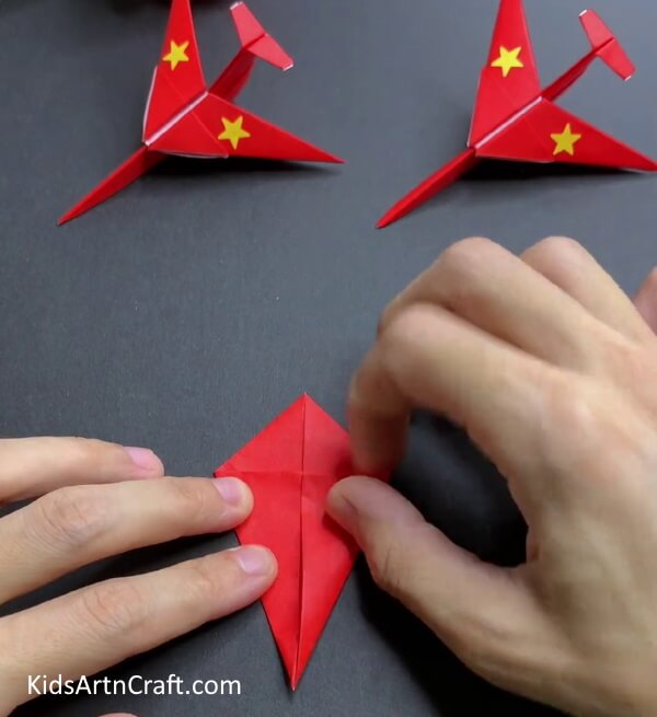 Folding The Sides - Creating an Origami Flyer with Paper
