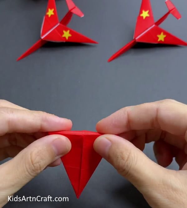 Folding The Upper Triangle - Assembling a Paper Airplane with Origami