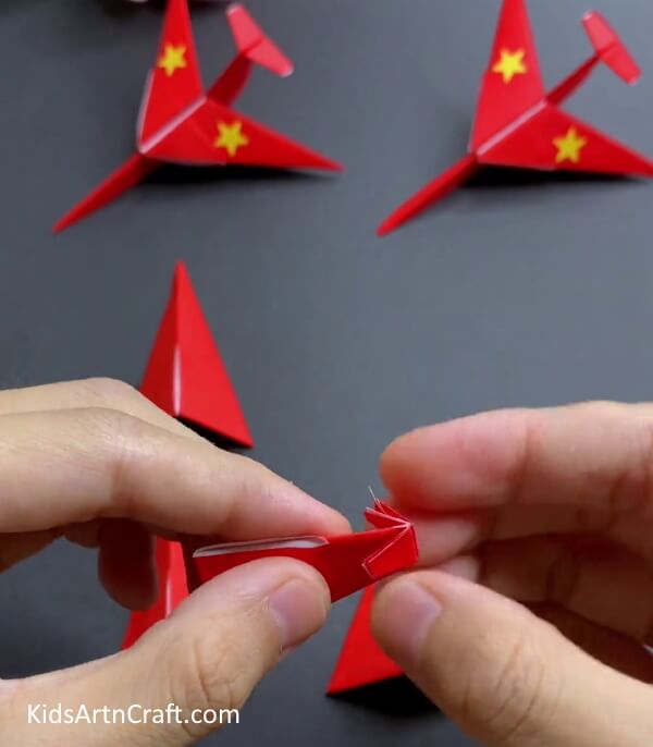 Folding The Corners Outwards - Forming an Origami Craft with Paper