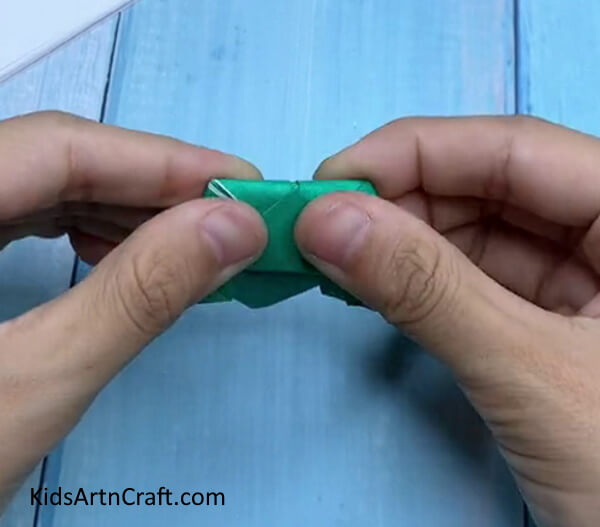 Folding - This guide instructs children in creating a frog out of paper through origami. 