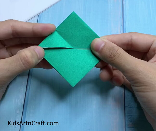 Forming a Diamond Shape - Teaching Kids How to Make a Paper Frog Utilizing Origami Techniques