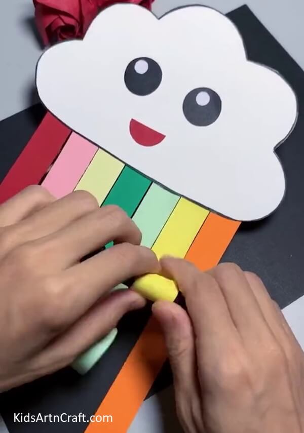 Rolling Rainbow Strips - Designing a Rainbow Cloud with Paper is a Snap