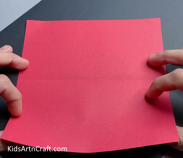 Folding Square Paper In Half - Creating a Simple Snowflake Design Using Paper