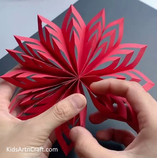 Unfolding Paper Designs - Constructing an Easy Snowflake Outline Using Paper