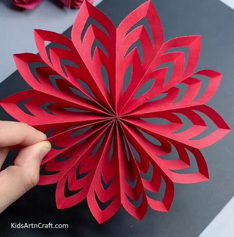 Simple Snowflake Craft Using Red Paper For Young Ones