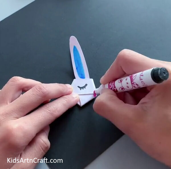 Add Eyes And Nose-Assembling a Bunny Countenance with Paper Strips for the Tykes
