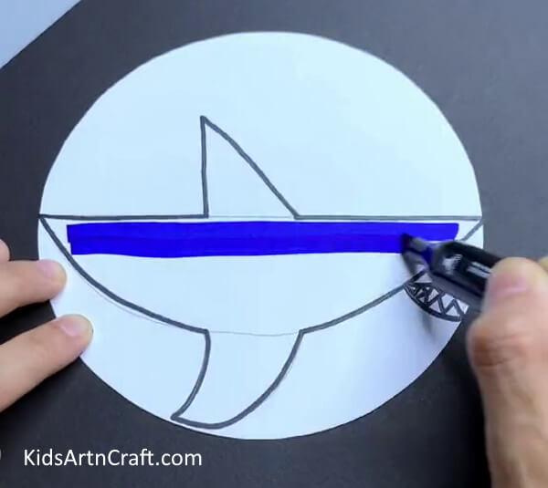Color The Shark With a Blue Marker- A how-to guide for creating a paper shark for kids 