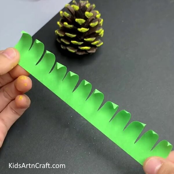 Rolling The Leaves - Simple Tutorial for Kids to Construct a Pineapple Pine Cone