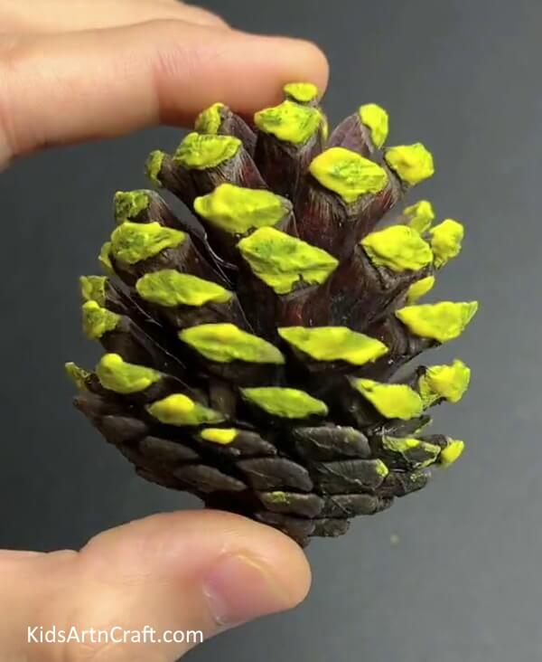 Letting It Dry - Step-by-Step Guide for Kids on How to Make a Pineapple Pine Cone 