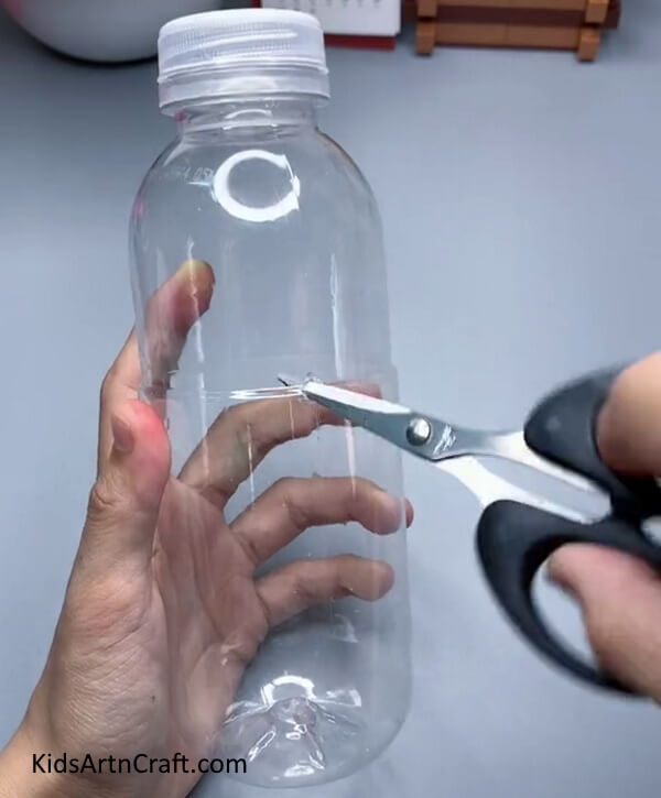 Poke a Hole In a Plastic Bottle