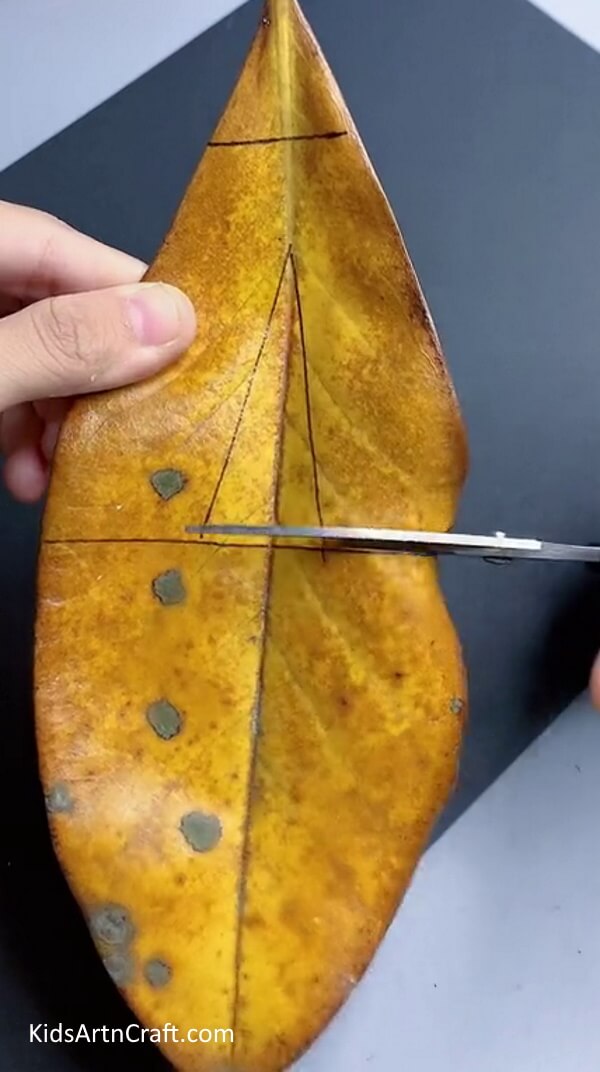 Making Pants From Yellow Leaf - Learn How to Create a Boy with Autumn Leaves with This Step-By-Step Guide
