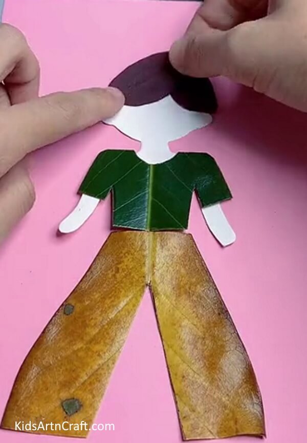 Making Hairs Of The Boy - Learn How to Form a Boy with Fallen Leaves with These Step-By-Step Directions
