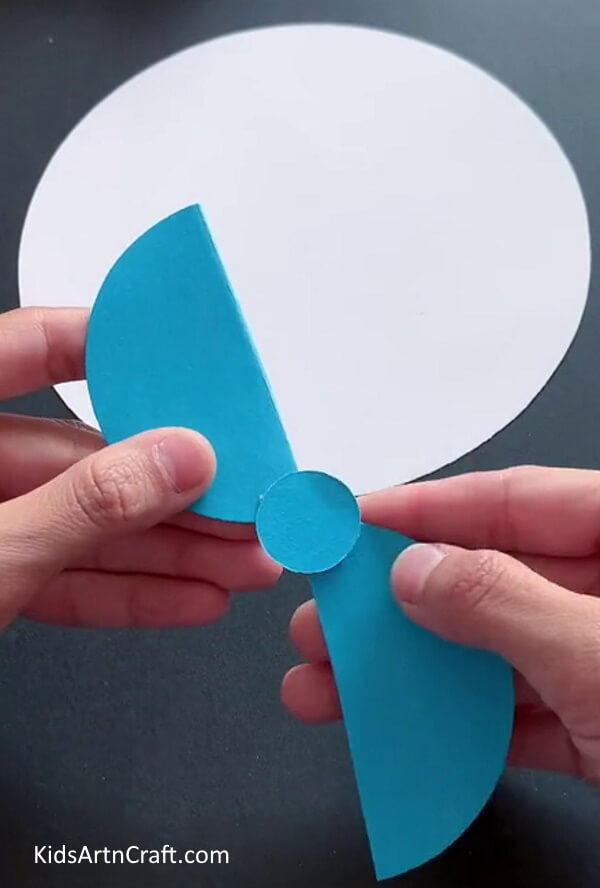 Adding The Wings - A Guide to Constructing a Summertime Paper Fan for Children