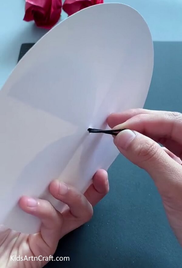 Attaching Paper Fan With White Circle - Comprehensive Directions to Make a Summertime Paper Fan for Youngsters