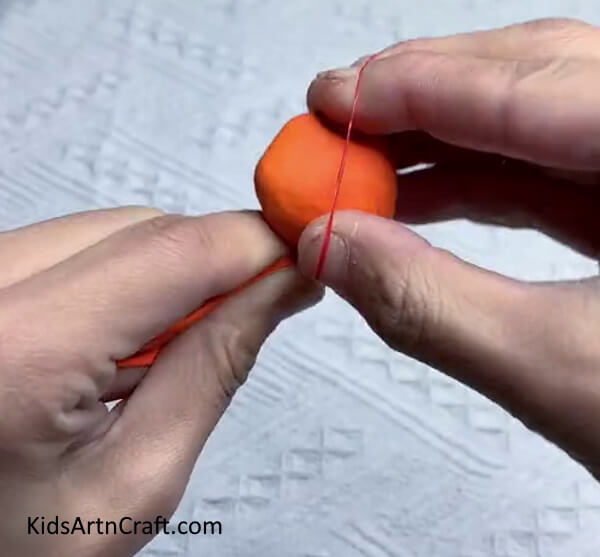 Put An Elastic Rubber Band Over It-Step-by-Step Instructions to Create a Tiger Balloon for Kids