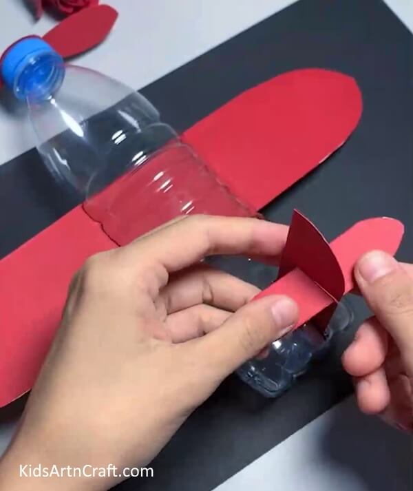 Completing Fin - How To Create An Airplane From Recycled Water Bottles - Step By Step Guide