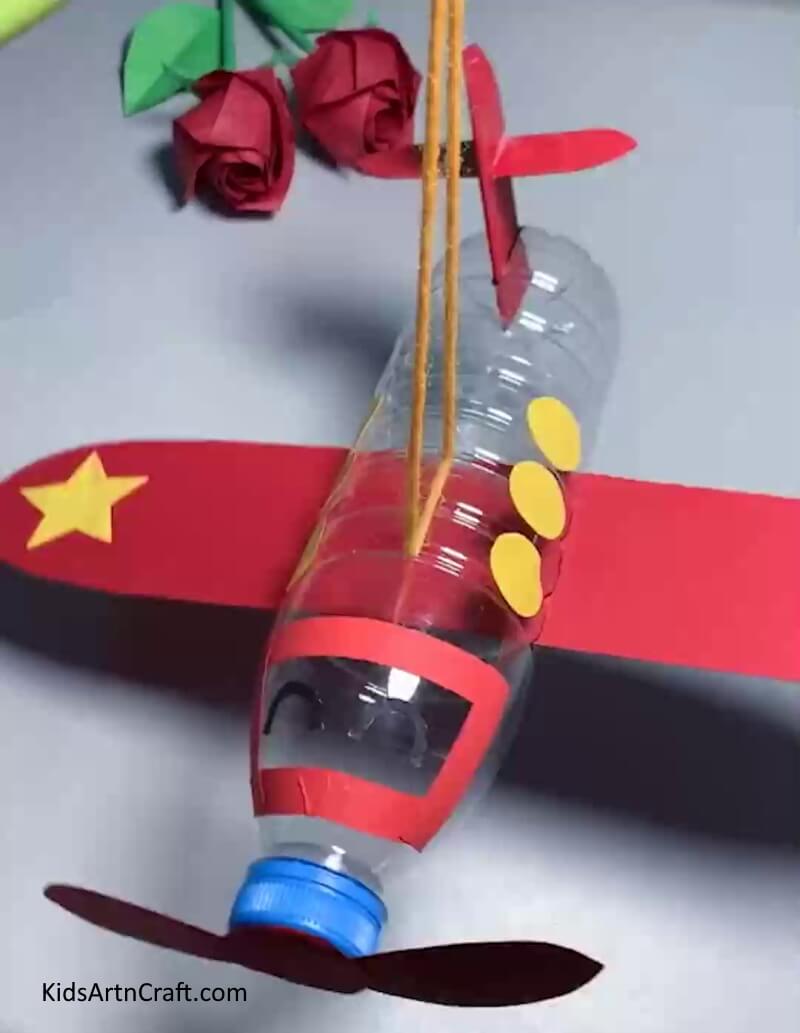 Constructing a Water Bottle Airplane Craft For Children