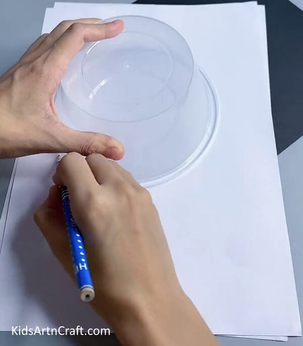 Drawing Circle Shape On White Paper - Easy-to-follow guide on creating Watermelon crafts