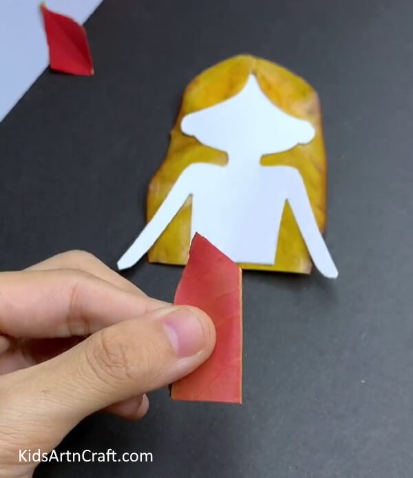 Making Top of Dress Using Red Leaf - A Delightful Autumn Leaf Doll Art & Creation Idea For Kids