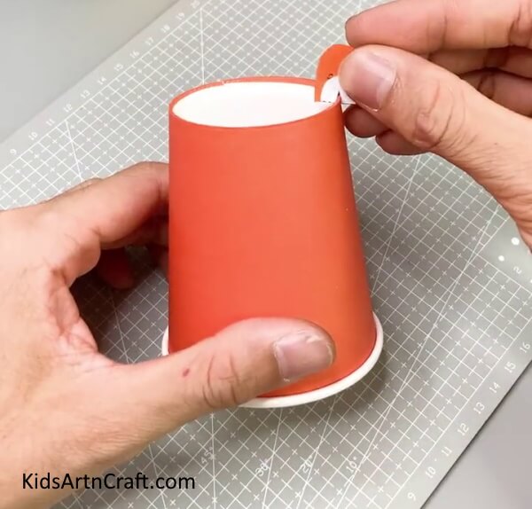 Pasting The Ears Of The Tiger - Delightful Tiger Paper Cup Project For Youngsters 
