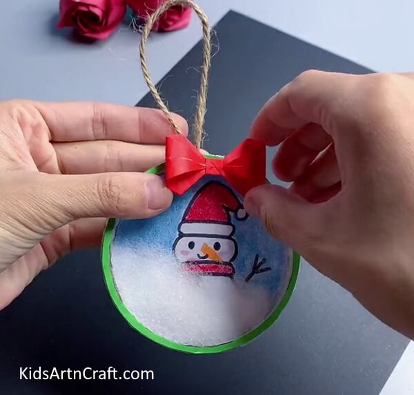 Pasting Red Ribbon - Crafting a gorgeous Christmas decoration for the home. 
