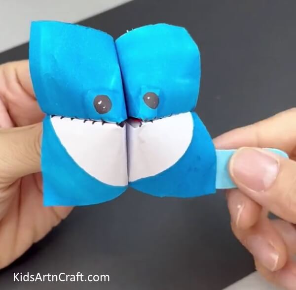 Adding Fin To The Shark - Step-by-step instructions for crafting a paper shark with origami