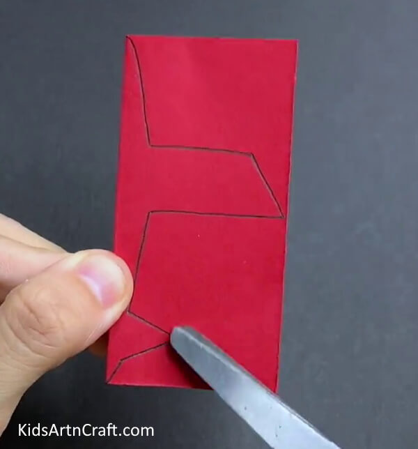 Cutting Out The Paper Airplane - Instructions on how to craft a basic paper airplane in a simple-to-follow tutorial for little ones. 