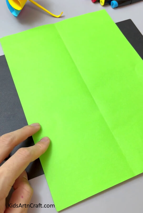Folding Green Paper In Half - Crafting a Paper Flower-- Simple for Kindergartners!