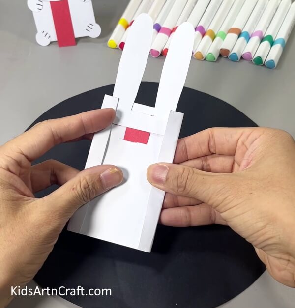 Folding Sides Of Paper - Kids can have a fun time making a Bunny craft from handmade paper. 
