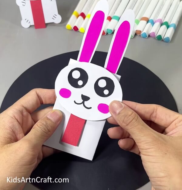 Making the Face Of Bunny - Children can make a Bunny craft out of handmade paper. 