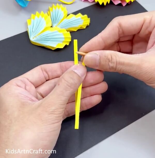 Rolling The Ends - Fabricate a Paper Butterfly - An Effortless Craft for Kids