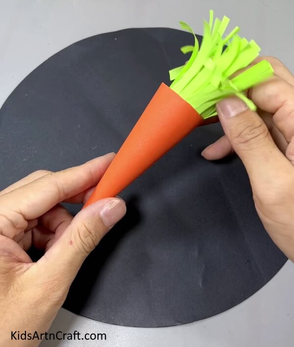 Inserting Leaves In Cone - How to Create a Paper Carrot With Clear Directions