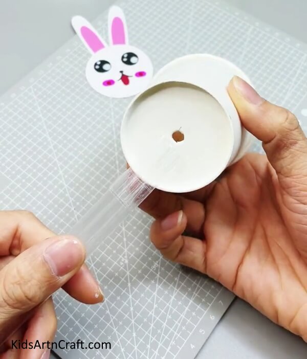  Making Holes In Paper Cup - Constructing a Bunny with Reused Paper Cups for Youngsters