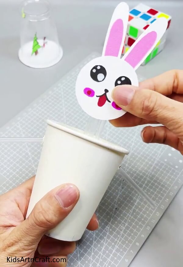 Pasting Face On Middle Straw - Putting Together a Bunny Using Old Paper Cups for Young People
