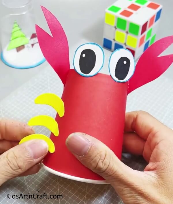 Pasting Legs - Directions For Creating a Reused Paper Cup Crab