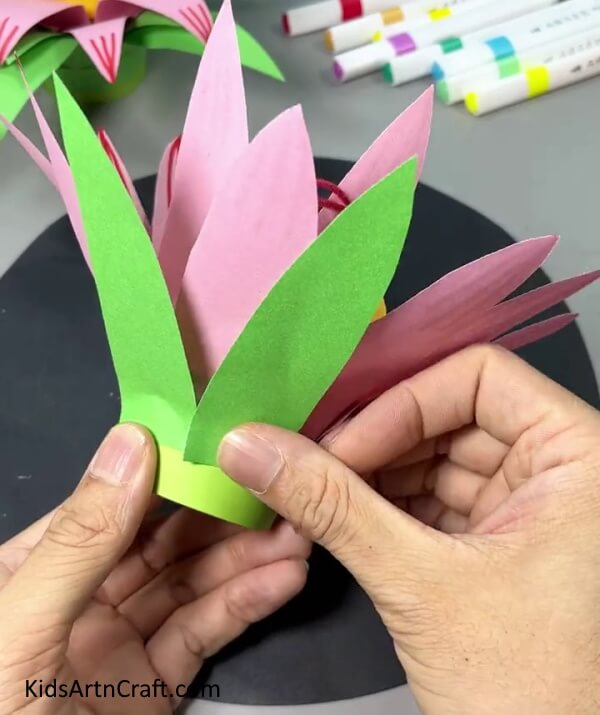 Cover Paper Cup Using Green Paper Leaves - Find Out How to Create a Paper Flower Hanging with This Step-by-Step Tutorial