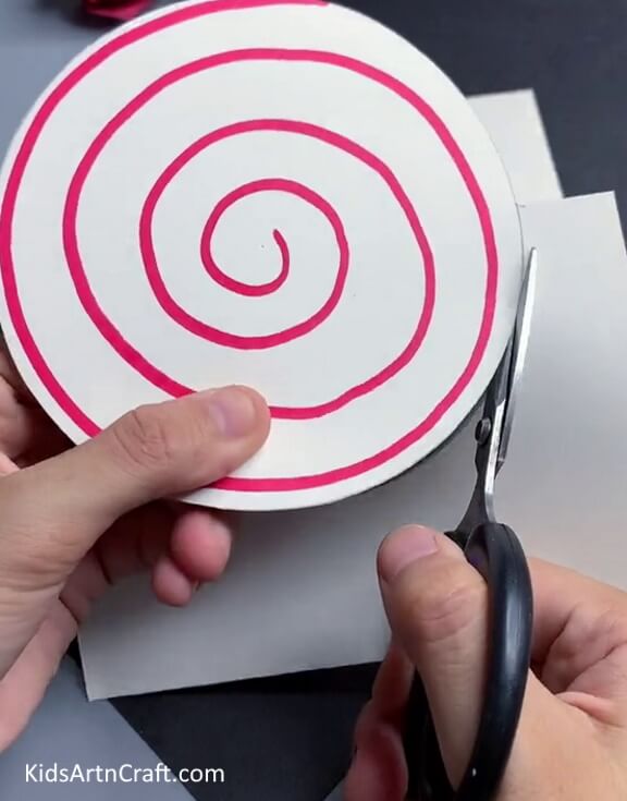 Cutting Out The Extra Part-Create a Paper Spinner Toy for Kids to Have Fun With