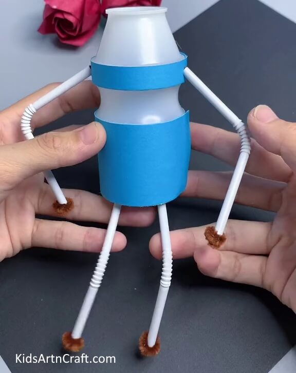 Inserting Straw In Pipe Cleaners - Fabricating a Doll Using a Plastic Bottle & Discarded Supplies 
