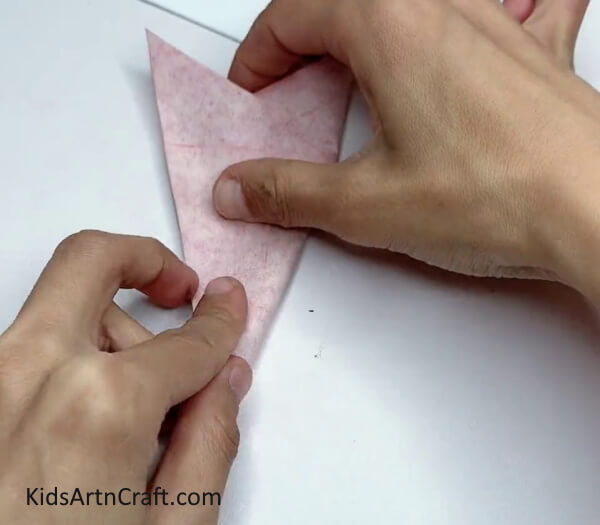 Cutting The Pointed Ends - Put Together Your Own Snowflake Creation for Kids