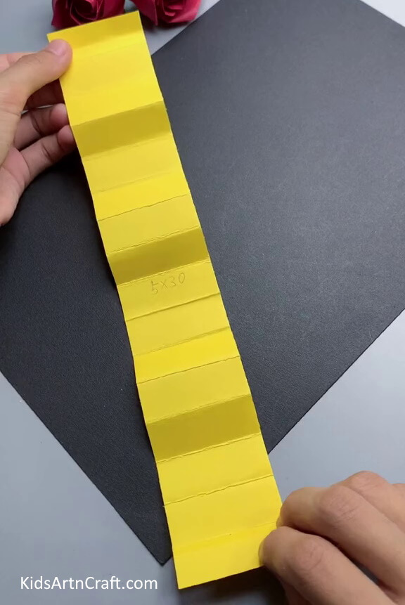 Getting Yellow Paper and Fold It - Tutorial on how to make a Dragon with ease for children.