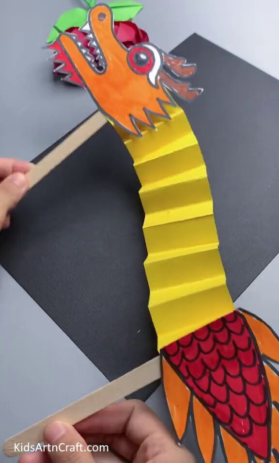 Paper Dragon Craft Is Here! - Here's a straightforward guide to making a craft for children. 