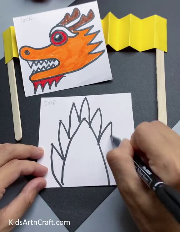Drawing Dragon's Tail - A simple Chinese Paper Dragon craft guide for kids.