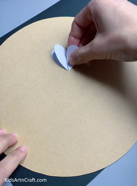 Pasting the Petals on the Cardboard - Simple paper flower creation for youngsters. 