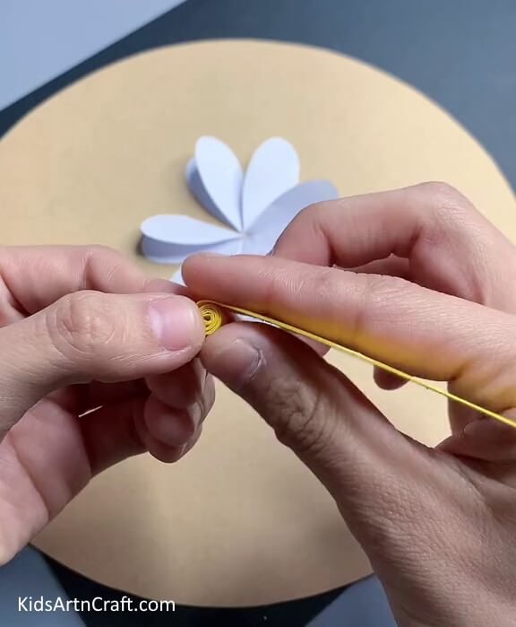Making Pistil of the Flower - Artistic paper flowers constructed effortlessly for kids. 