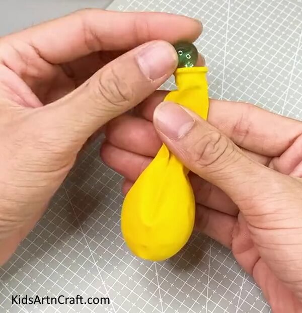 Inserting a Marble Ball Into Balloon - Kids Can Have Fun With A Creative Balloon Emoji Project 