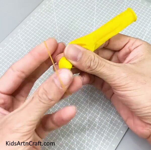 Tying Knot On Balloon - An Artistic Balloon Emoji Activity For Kids 