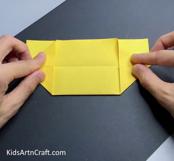 Folding Corners To The Middle Crease - An Alluring Dragon Boat Crafting Instruction For Little Ones Employing Paper
