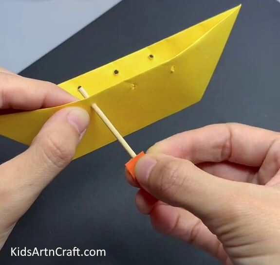 Attaching Oars Of the Boat - A Pretty Dragon Boat Construction Tutorial For Kids Using Paper