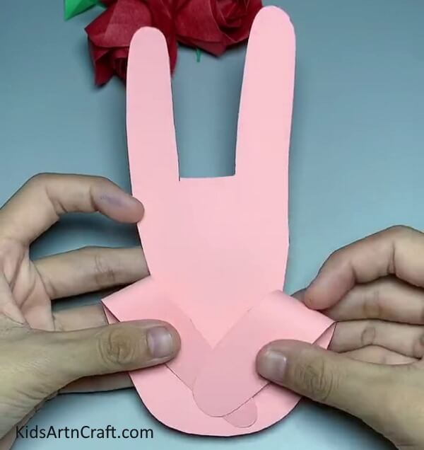 Pasting Thumb and Little Finger Together - Create Handprint Bunnies Using Paper